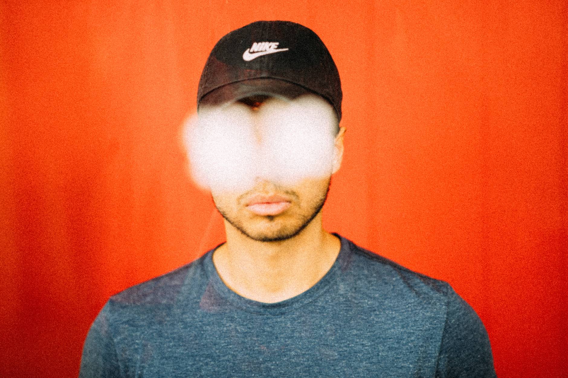anonymous man with spots on eyes imitating eyewear