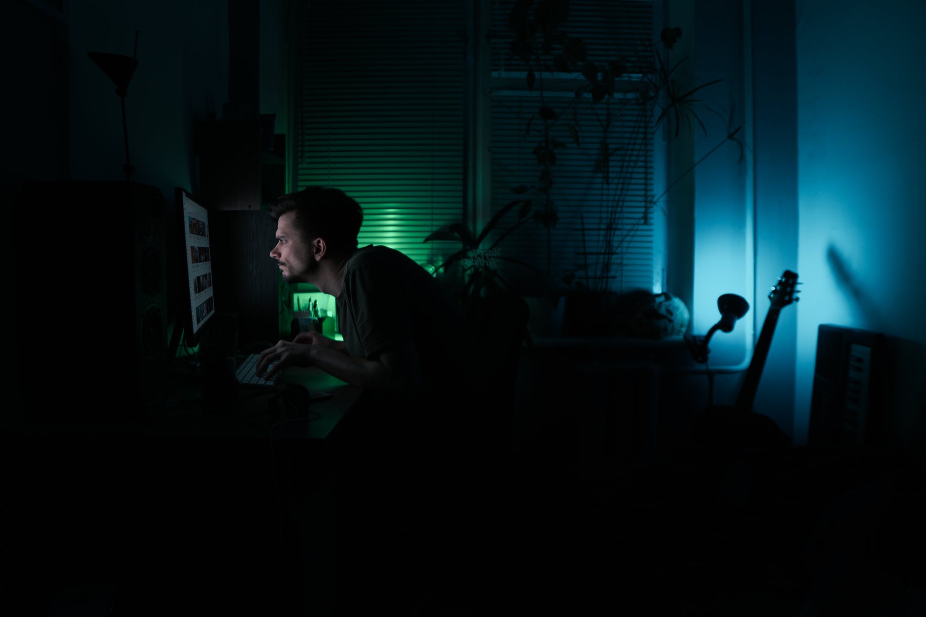 man working at night at home