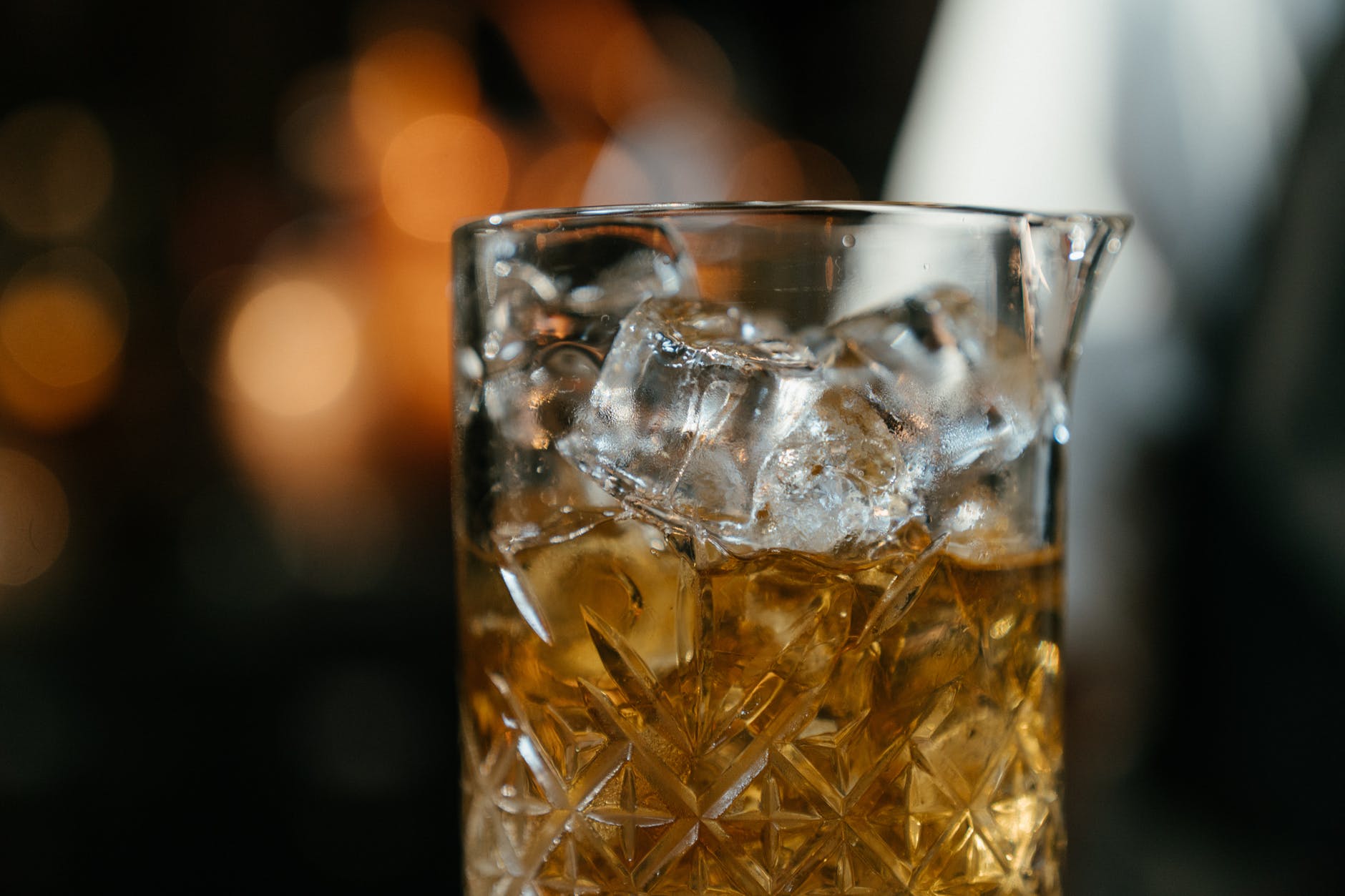 clear drinking glass with ice cubes